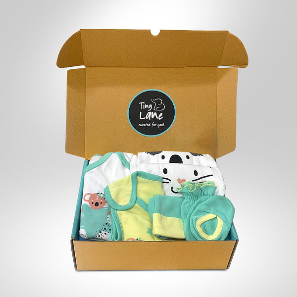 TinyLane Neonatal Essentials - (set of 7)  variant  1: Onesie - 1kresent koala + 2 Nappy +1 mint green CBM +1 KK bib+ blue Dry mat